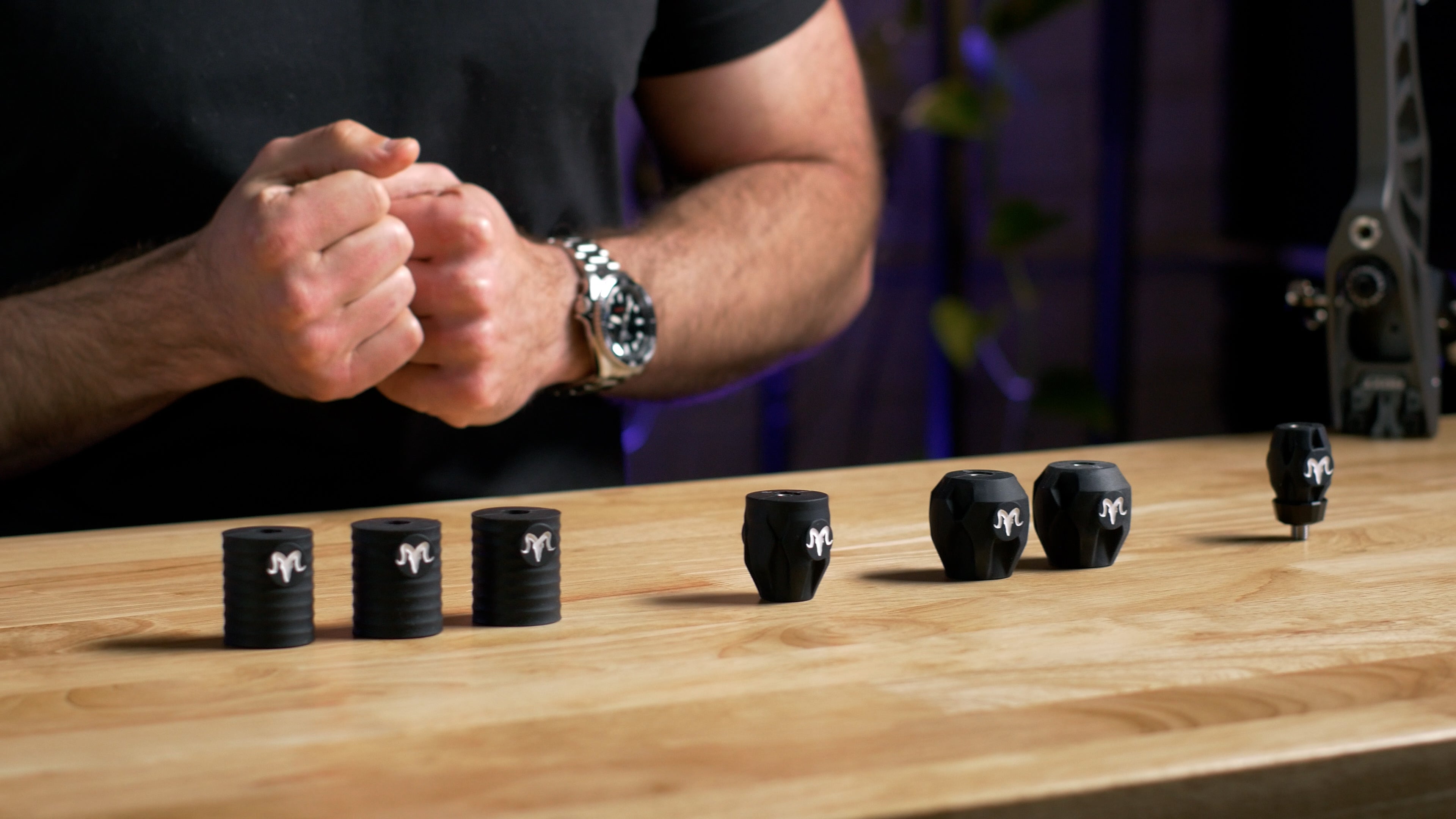 RamRods  EQ Cylinder, taper, barrel, and bow rubber dampers sitting on a table.