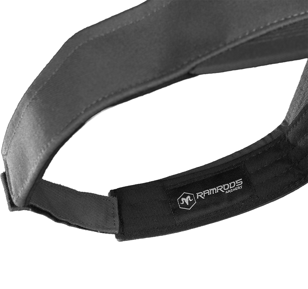 The inside of a gray visor with the RamRods logo tag